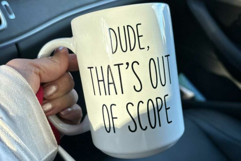 Coffee mug that has the text "Dude, that's out of scope"