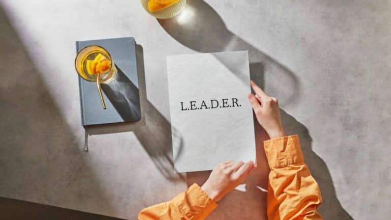 Book with L.E.A.D.E.R. on the cover