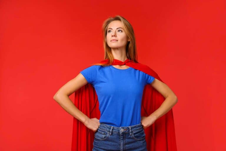 Woman overcoming business challenges with a power pose