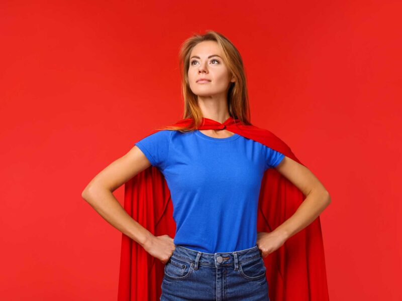 Woman overcoming business challenges with a power pose